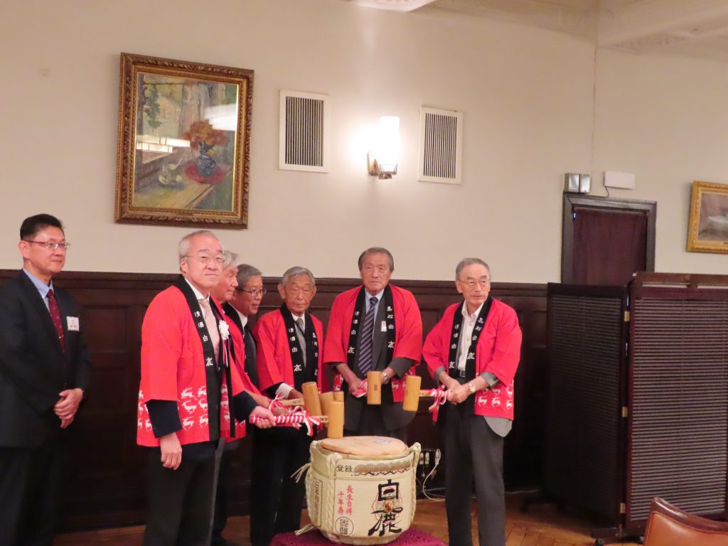 Opening a ceremonial sake barrel